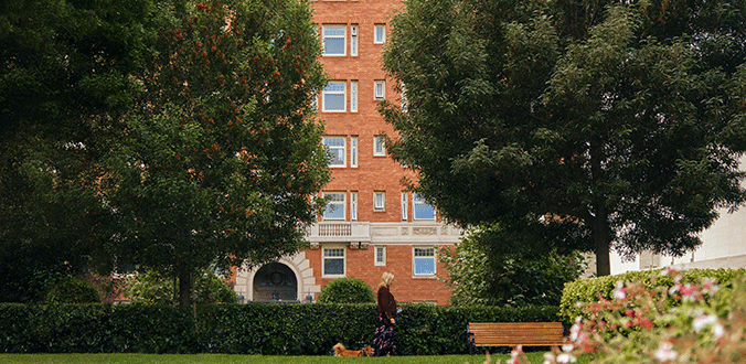 View of hotel facade from park