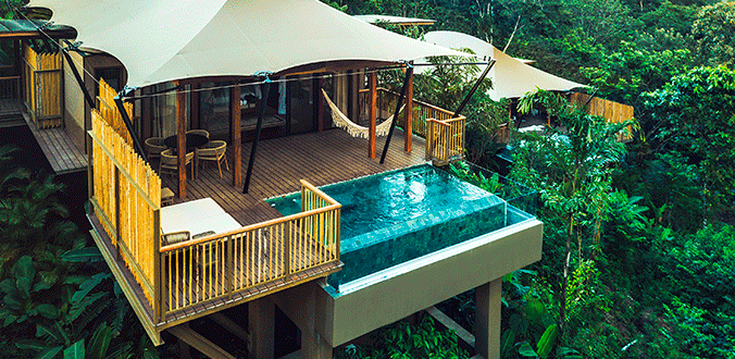 Aerial view of treehouse balcony with pool